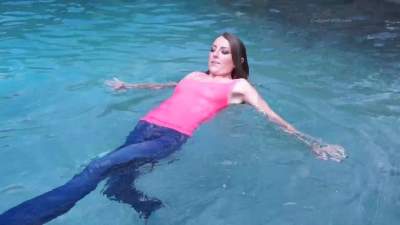 madison-steps-in-pool-with-jeans-and-t-s